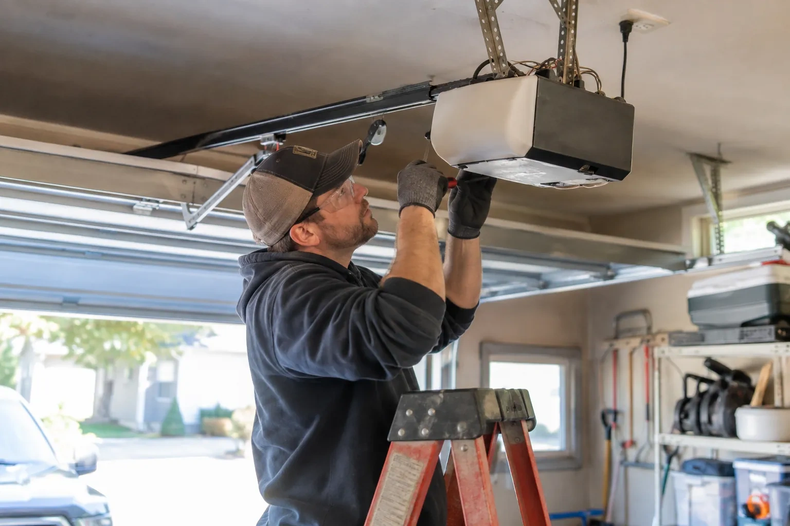 Illustrative garage doors scene; not an actual job