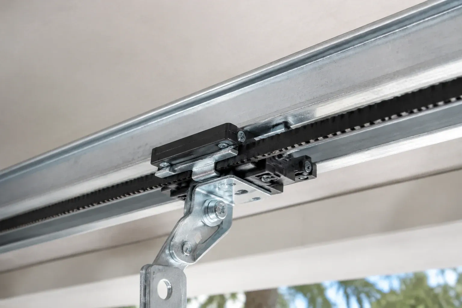 Illustrative garage doors scene; not an actual job — Belt-Drive Opener Repair, New Tecumseth